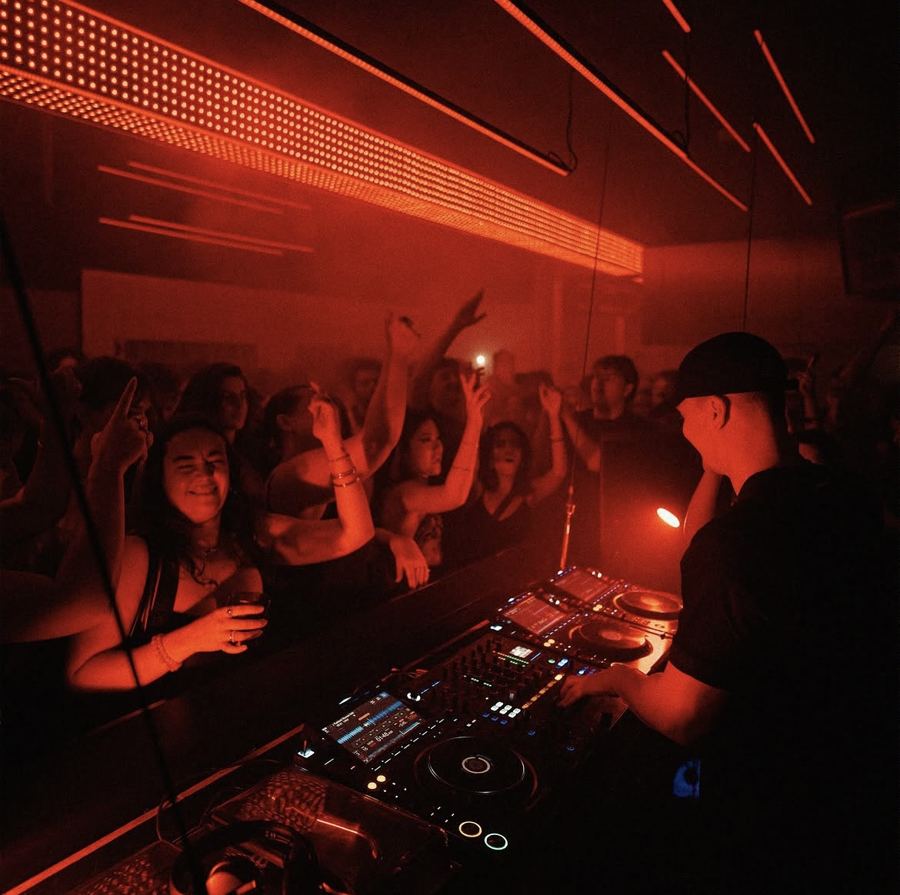 Crowd dancing, blue lighting