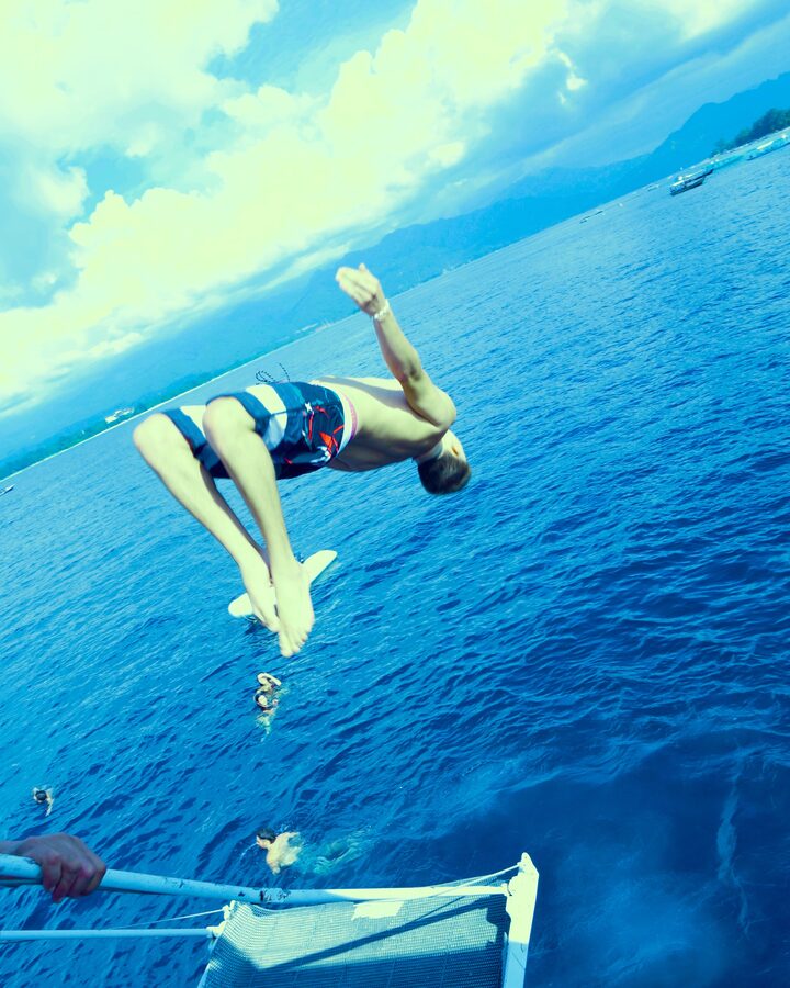 Backflip off the boat into the ocean