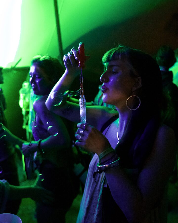 Blowing bubbles under green light