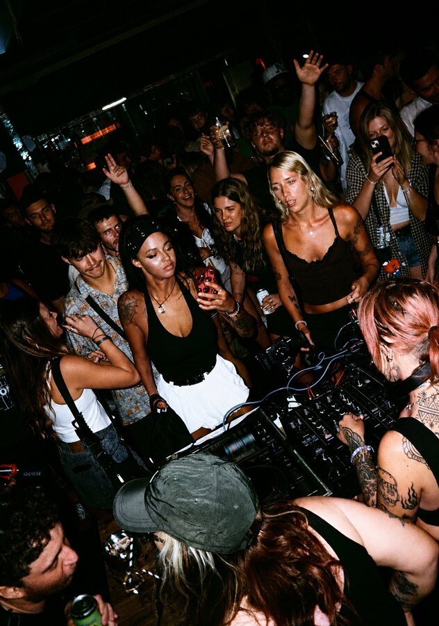 Crowd gathered around the DJ booth